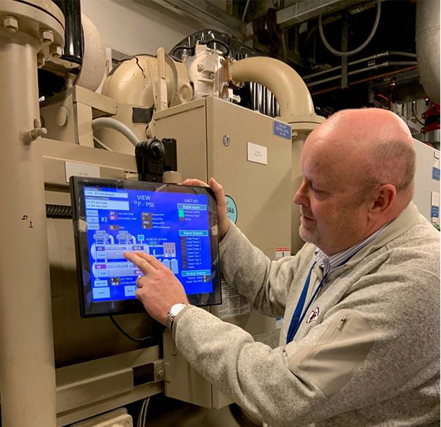 scientist with screen